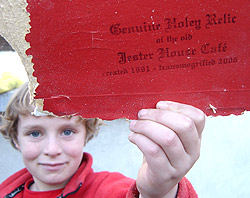 Holding up a genuine holey relic of the old Jester House Cafe found during its transmogrification. 'We're not making it bigger,' said Steve Richards, 'just better'. 